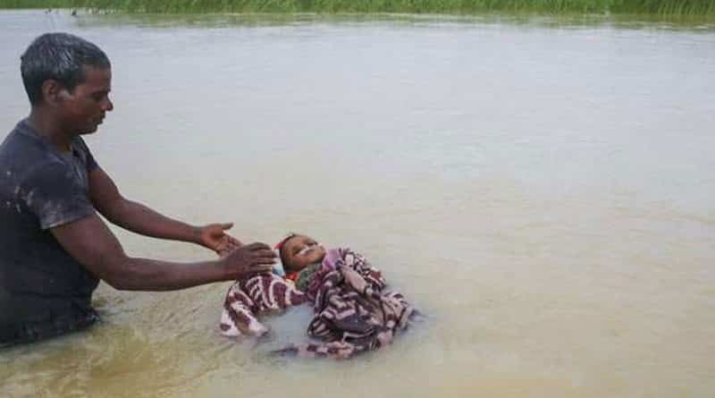 Man cremates daughter in river in flood devastated Nepal 