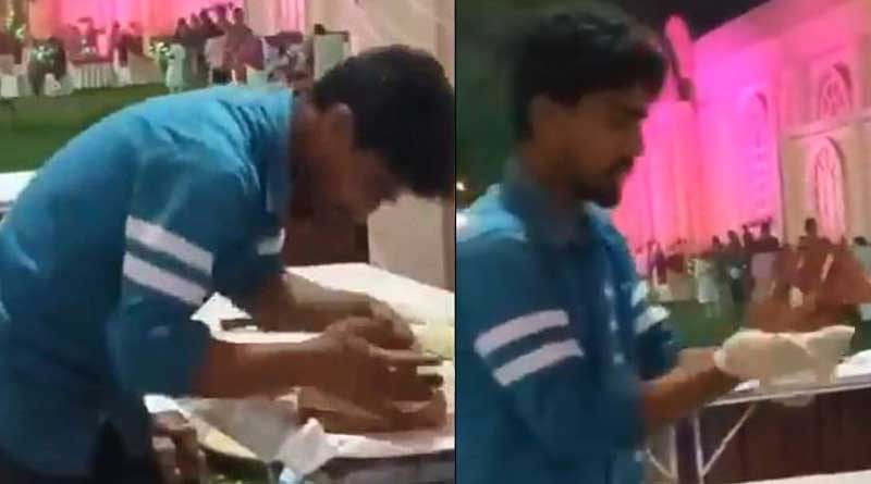 Netizens react to viral video of man allegedly 'spitting' on rotis at wedding function | Sangbad Pratidin