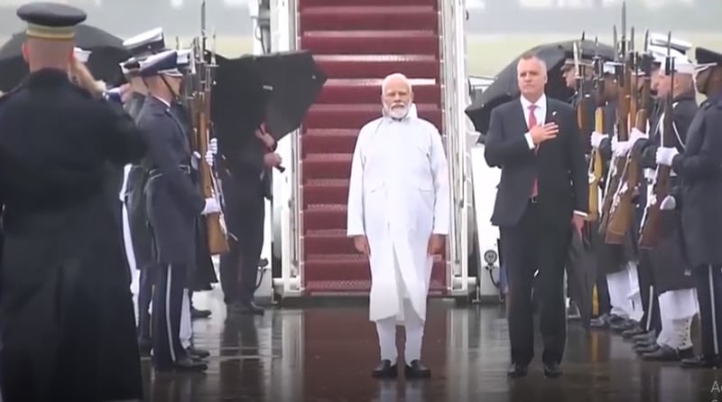 ‘Indra Devta’s blessing’, PM Modi stands in rain in Washington National anthem plays। Sangbad Pratidin