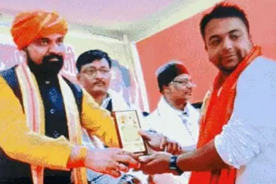 Accused Amit Anand with Bihar Deputy Chief Minister, RJD shares pic