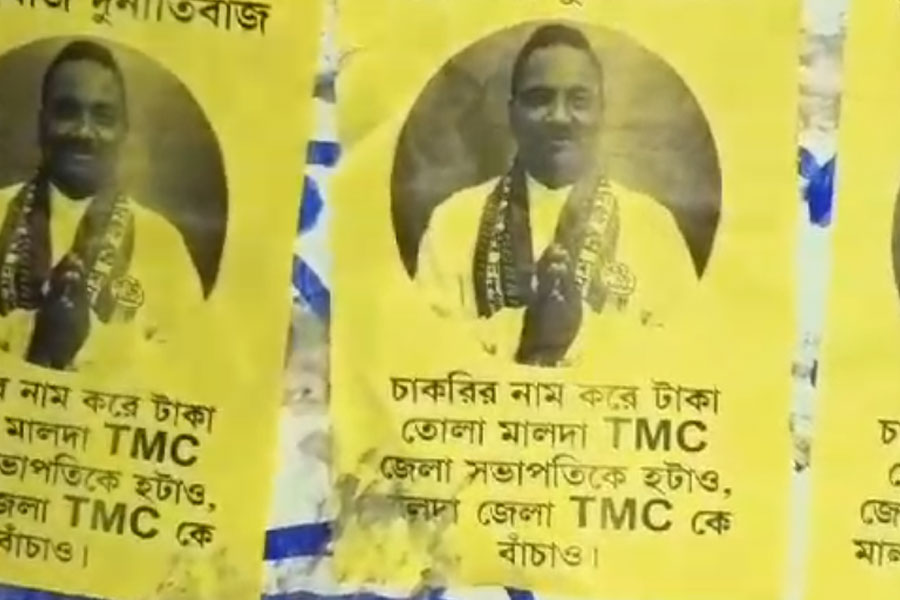 Poster against TMC district president in Malda