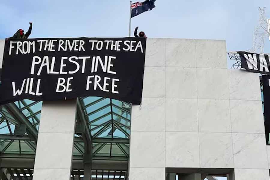 4 pro-Palestine protesters scale Australian Parliament's roof