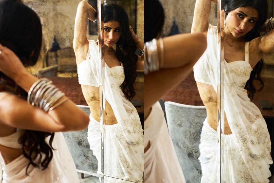 Mouni Roy Raises Heat As She Flaunts Bombshell Body In Sleek White Saree
