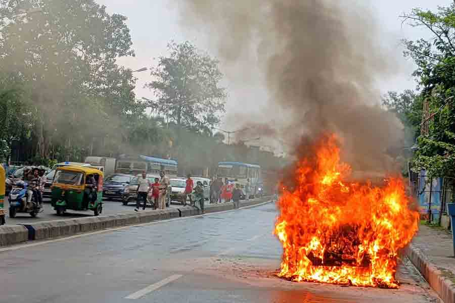 Running car caught fire in VIP