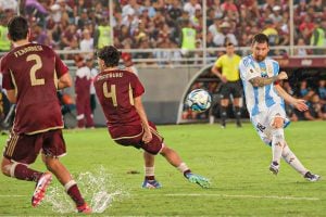 Argentina held in a draw with Venezuela while Lionel Messi fumes on pitch conditions