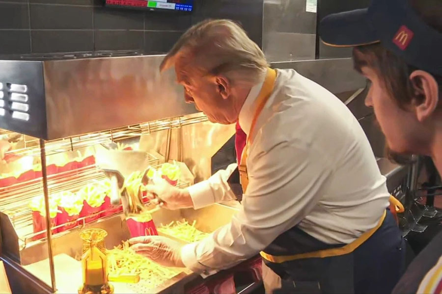 Donald Trump makes fries at McDonald's