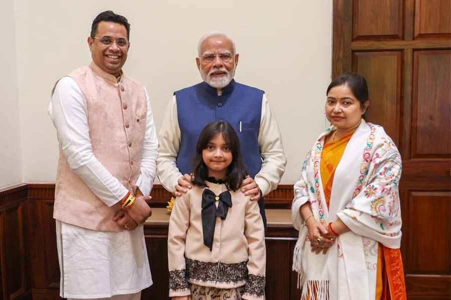 PM Narendra Modi met MP Saumitra Khan, his wife and daughter