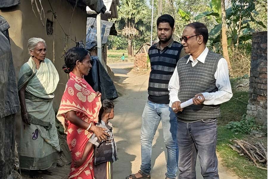 Uluberia teachers visiting student's home to bring them to school