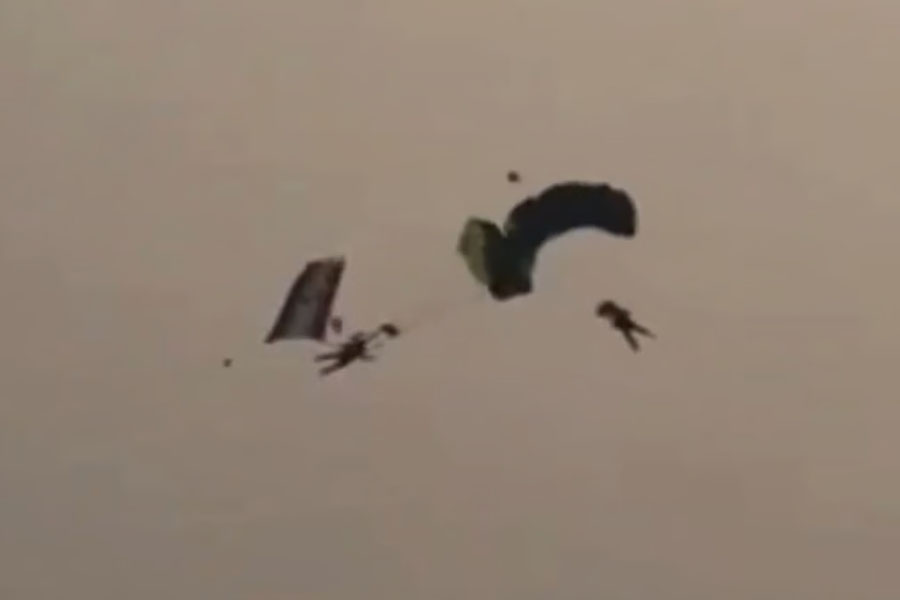 Navy Officers In Free Fall After Parachutes Entangle During Descent