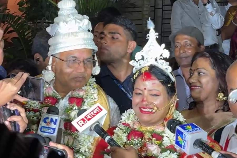 Dilip Ghosh and Rinku Majumdar appear to the press together after marriage