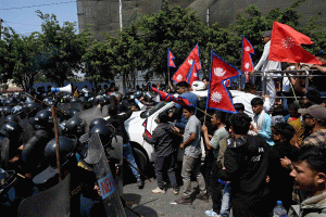 Nepal PM Oli warns of legal actions against protestors and former king