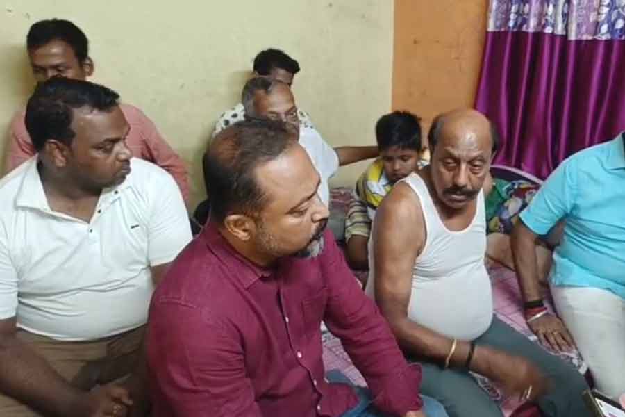 TMC leadership at the home of the soldier in Rishara